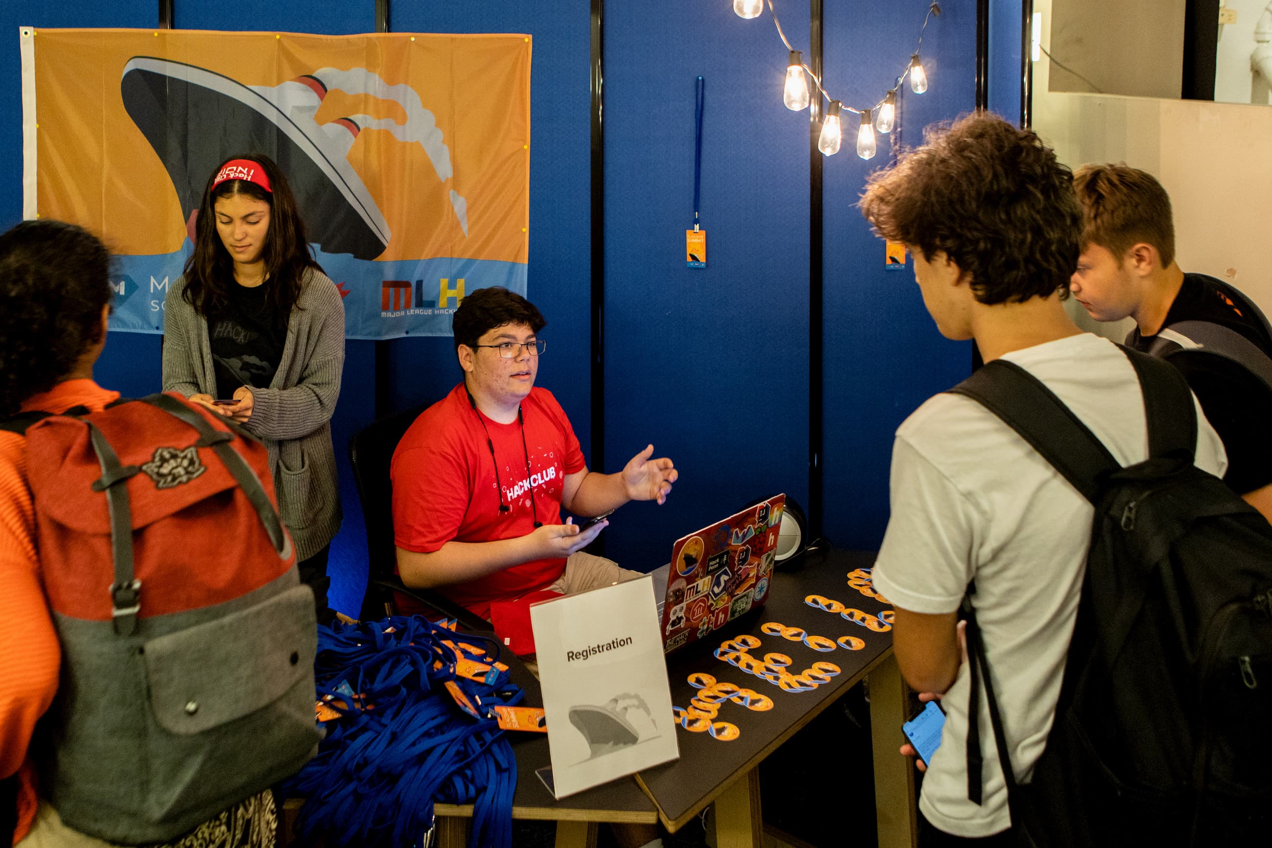 Theo checking in attendees at the Flagship Conference, 2019
